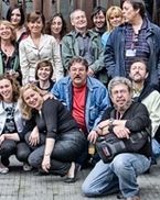 Parte del equipo de la Semana Negra, con Paco Ignacio Taibo II (al centro), tras la ceremonia de clausura