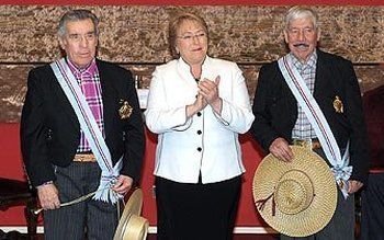 Marcial y Eleodoro Campos con la ex presidenta de Chile, Michelle Bachelet